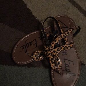 Cheetah flip flops.